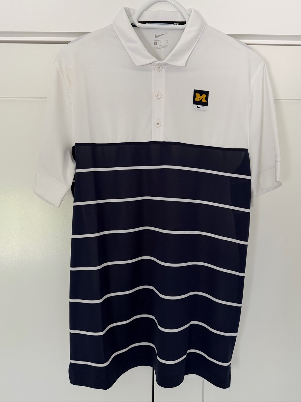 Nike Men’s White and Navy Michigan Polo Shirt